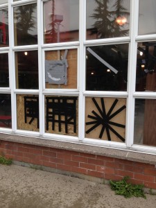 Broken windows were fixed by custodial staff early Monday.