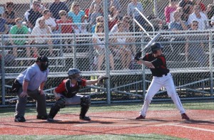 Arshia Kiani | Hawkeye Junior Wyatt Allemann slugged a triple inning against Stanwood to give the Hawks a 4-1 lead last Tuesday.