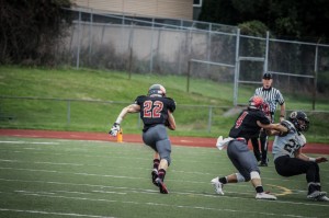 Ryan LaCasse scores early for the Hawks in a 30-14 rout over the Royals on Friday, Sept. 20 at Edmonds Stadium. TK Johnson | Hawkeye