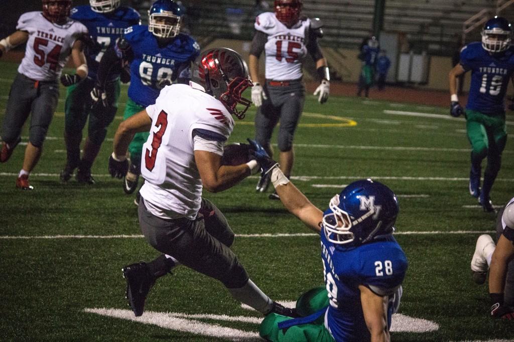 The Hawks' Chance Ragsdale (3) ran for an unofficial 145 yards and finished with a school season record of 1574 yards.
